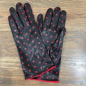 Polka dotted red and black leather gloves